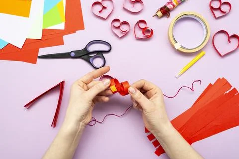 DIY instruction. Step by step guide. The process of making a garland of heart Stock Photos