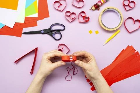 DIY instruction. Step by step guide. The process of making a garland of heart Stock Photos