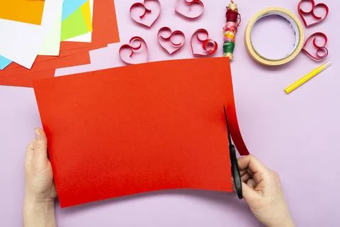 DIY instruction. Step by step guide. The process of making a garland of heart Stock Photos