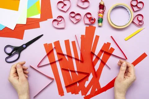 DIY instruction. Step by step guide. The process of making a garland of heart Stock Photos