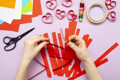 DIY instruction. Step by step guide. The process of making a garland of heart Stock Photos