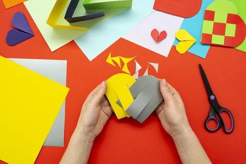 DIY instruction. Step by step guide. The process of making a paper heart from Stock Photos