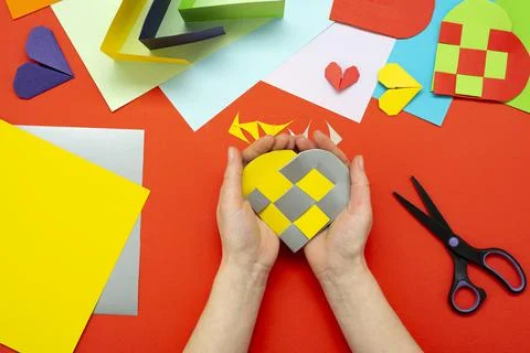 DIY instruction. Step by step guide. The process of making a paper heart from Stock Photos