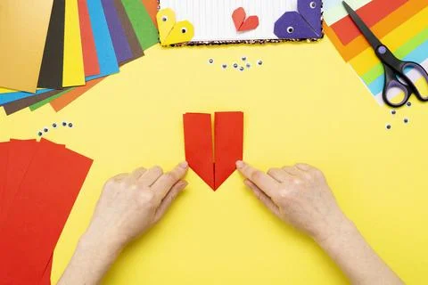 DIY instruction. Step by step guide. The process of making a bookmark for a b Stock Photos