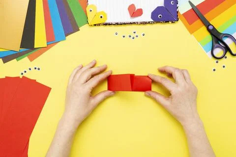 DIY instruction. Step by step guide. The process of making a bookmark for a b Stock Photos