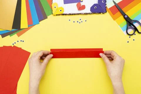 DIY instruction. Step by step guide. The process of making a bookmark for a b Stock Photos