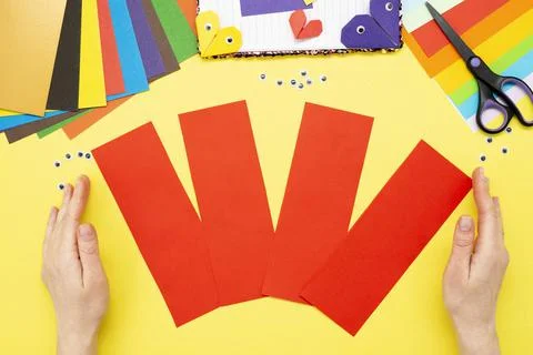 DIY instruction. Step by step guide. The process of making a bookmark for a b Stock Photos