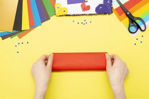 DIY instruction. Step by step guide. The process of making a bookmark for a b Stock Photos