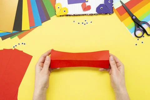 DIY instruction. Step by step guide. The process of making a bookmark for a b Stock Photos