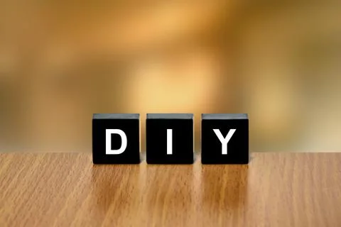 DIY or do it yourself on black block Foto stock