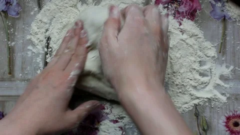 DIY pizza step 1 roll out the pizza dough. Stock Footage 129569801