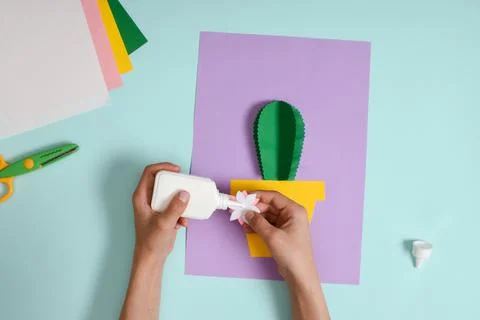 DIY. A postcard with a cactus in a pot. Step-by-step photo instruction. Stock Photos