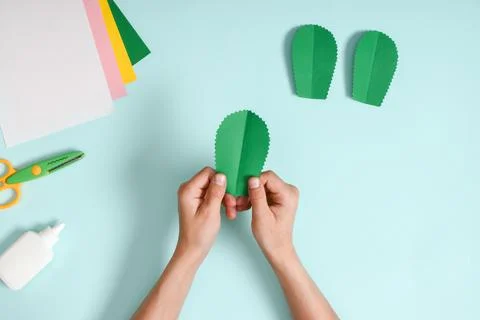 DIY. A postcard with a cactus in a pot. Step-by-step photo instruction. Stock Photos