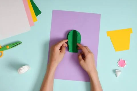 DIY. A postcard with a cactus in a pot. Step-by-step photo instruction. Stock Photos