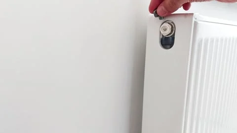 DIY Radiator Bleeding: Release Air, Save Energy Video stock 317602559