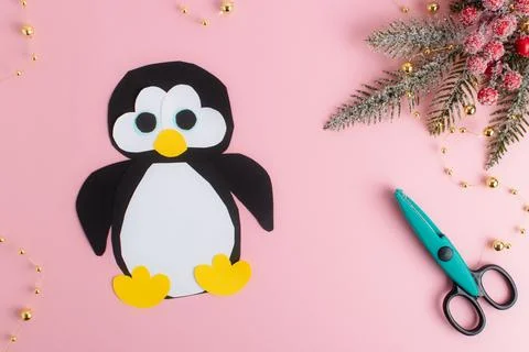 DIY. Step-by-step instructions for making a penguin out of paper. Flat lay,.. Stock Photos