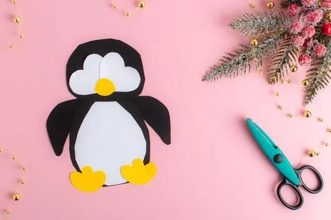 DIY. Step-by-step instructions for making a penguin out of paper. Flat lay,.. Photos
