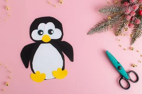 DIY. Step-by-step instructions for making a penguin out of paper. Flat lay,.. Stock Photos