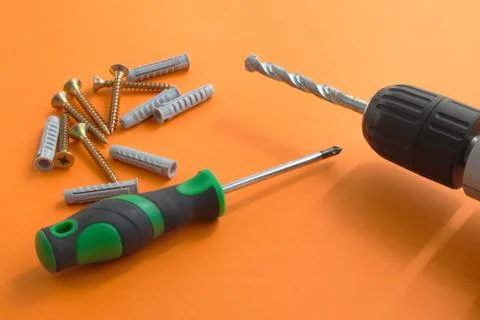 DIY tool set consisting of screws, dowels, screwdriver and drill Stock Photos