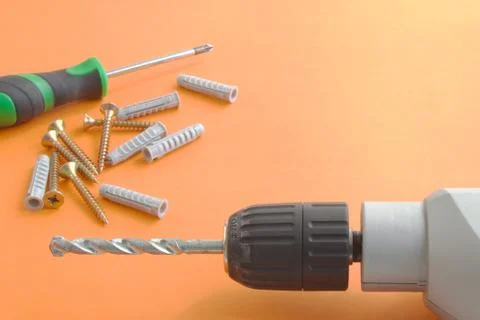 DIY tool set consisting of screws, dowels, screwdriver and drill Stock Photos