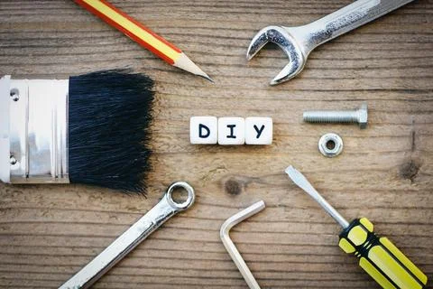 Diy tools concept - Working tools with wrench screwdriver nuts and bolts pa.. Stock Photos