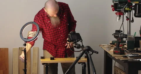 DIY woodwork vlogging setting up gear Stock Footage 153280331