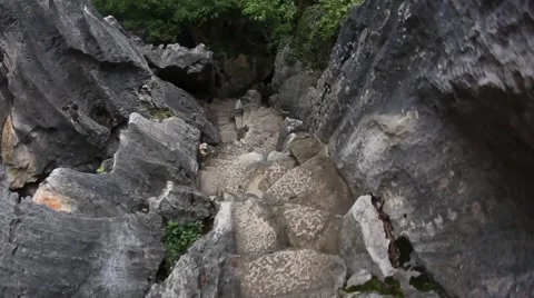 The dizzying descent of the stone steps Stock Footage 49523969
