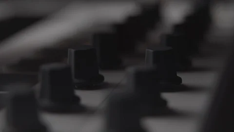 DJ adjusting audio effect knobs on MIDI keyboard while making music Stock Footage 108004579