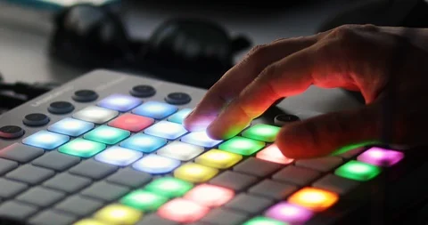 A DJ adjusts the levels of a song Stock Footage 112582016
