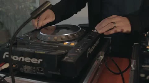 DJ on cd player and mixer 库存影片 21240983