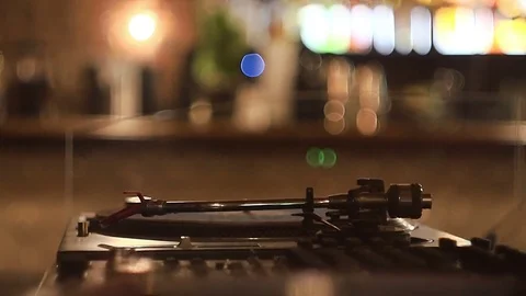 DJ console and turntable in the evening club cafe Stock Footage 82622982