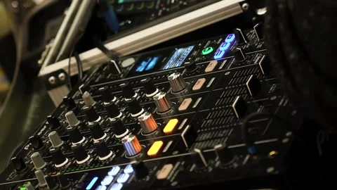 DJ at a Console Creating Music Pressing Buttons and Manipulating Knobs 스톡 동영상 299626243
