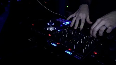 DJ console, mix, vinyl, operate the remote control Stock Footage 85437273