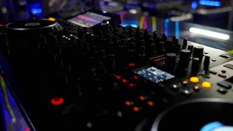 DJ Controller Display And Controls In Dark Environment. Professional Audio Mixer Stock Footage 335932717
