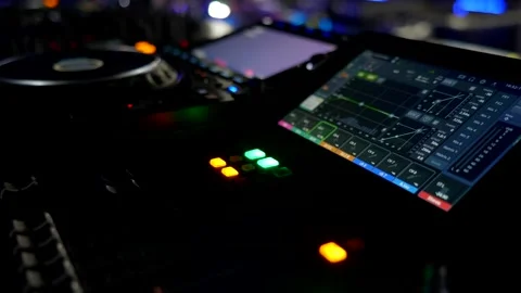 DJ Controller Display And Controls In Dark Environment. Professional Audio Mixer Stock Footage 335932778