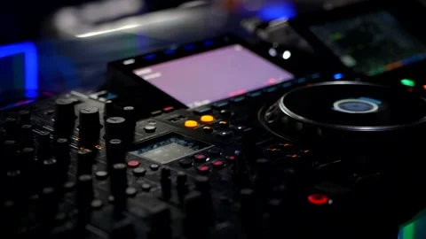 DJ Controller Display And Controls In Dark Environment. Professional Audio Mixer Stock Footage 335932841