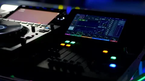DJ Controller Display And Controls In Dark Environment. Professional Audio Mixer Stock Footage 335932860