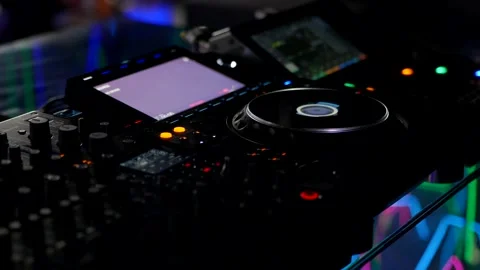 DJ Controller Display And Controls In Dark Environment. Professional Audio Mixer Stock Footage 335932893