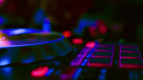 Dj controller with neon lights during night party music performance Stock-Footage 341970359