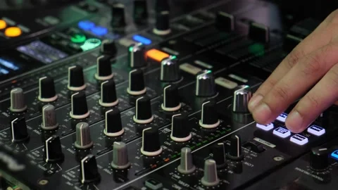 DJ creates music using DJ remote control Video stock 221697554