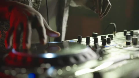 DJ dancing in rhythm at mixing console 스톡 동영상 170204289