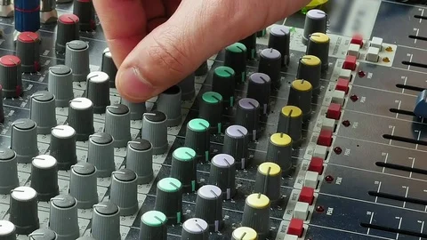 DJ deck mixing console sound board with hands Stock Footage 69963812