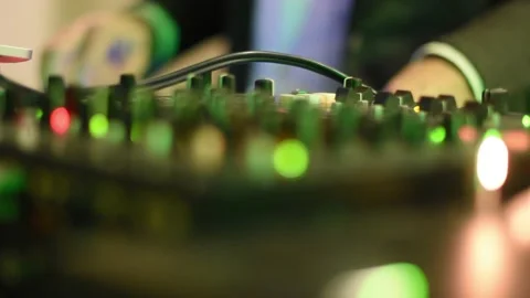 Dj dressed elegant at the mixer. Close up. Stock Footage 135612384