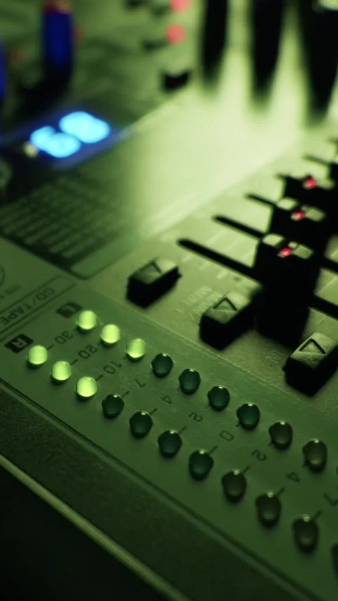 Dj Equipment Knobs and Level Meters Glowing in Purple Neon Club Light Stock-Footage 334739076