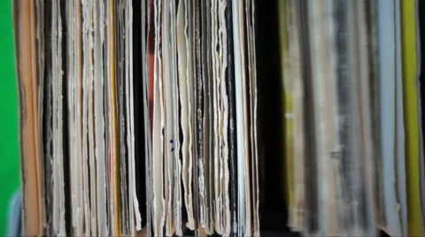 Dj Flipping through a crate of records 12" vinyl Stock Footage