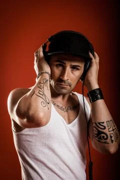 Dj in front of a red background Stock Photos
