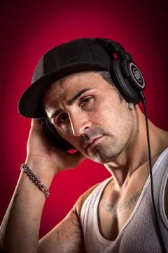 Dj in front of a red background Stock Photos