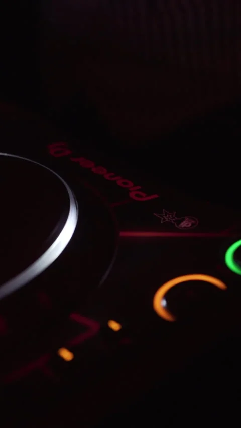 DJ Hand Adjusting CDJ Controls During Live Electronic Music Performance Stock Footage 337902687