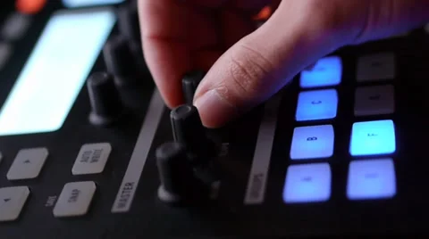 DJ Hand Adjusting Knobs During Live Performance Stock Footage 32219066