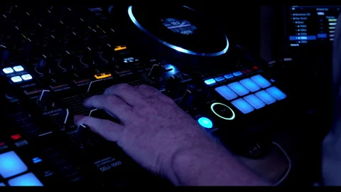 DJ Hand On Mixing Desk Stock Footage 243042622